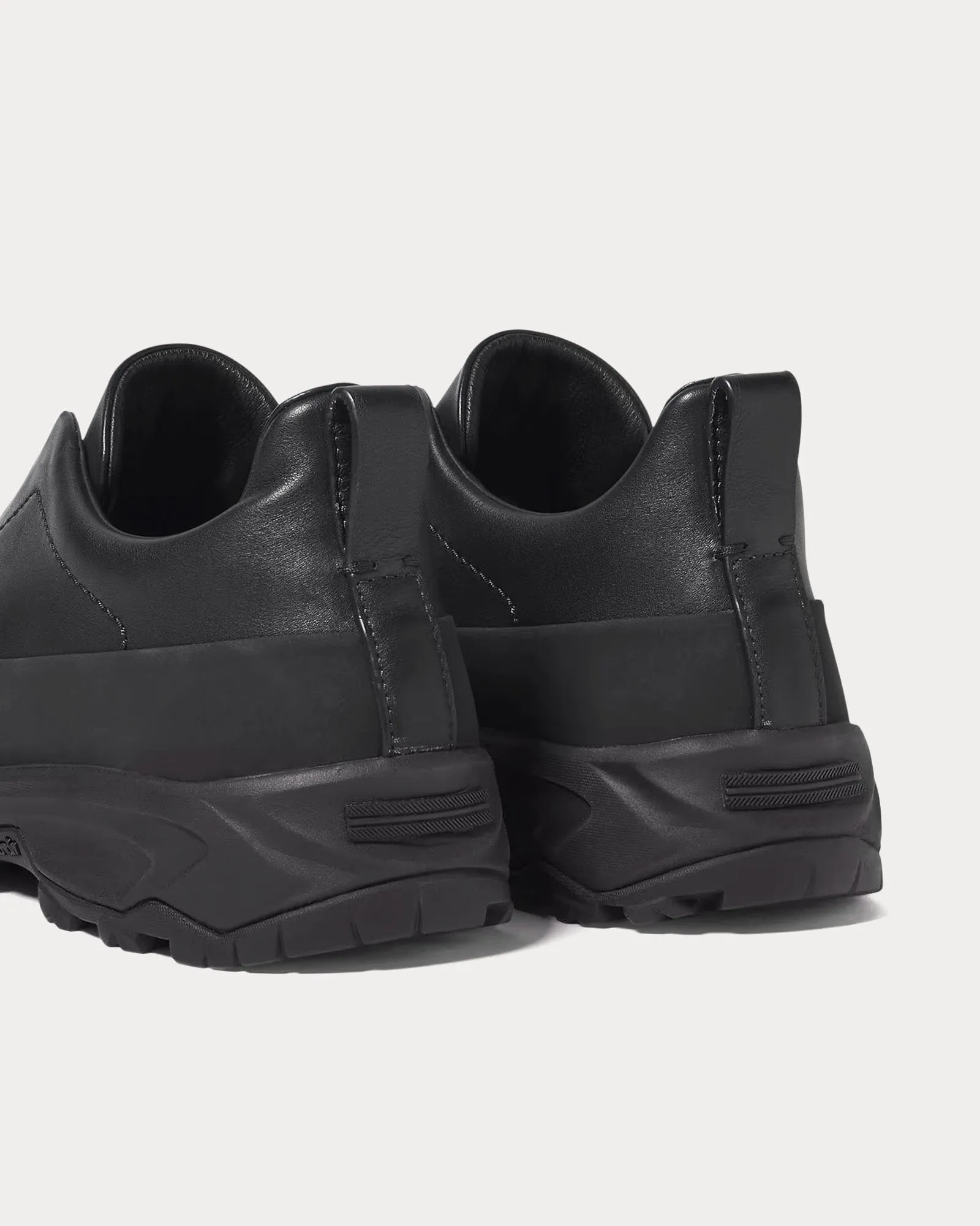 Triple Stitch Monte Leather Black Slip On Sneakers